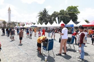 Lomba Estafet Air Meriahkan Aksi Merah Putih HUT ke-81 RI di Tanah Bumbu: Ajang Kekompakan dan Kebersamaan